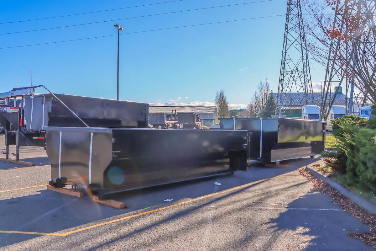 Roll-off dumpster ready for waste disposal at job site for 12 Yard Dumpster Rental in Mount Dora
